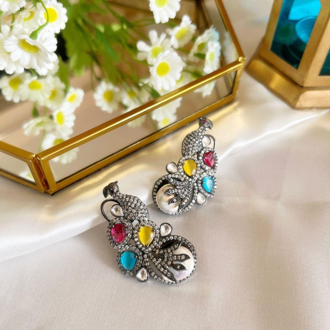 Peacock design earrings with MOP and American Diamonds - Kiasha 